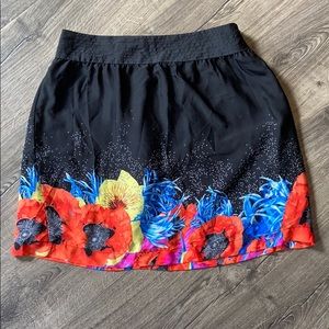 Mid length black and floral skirt